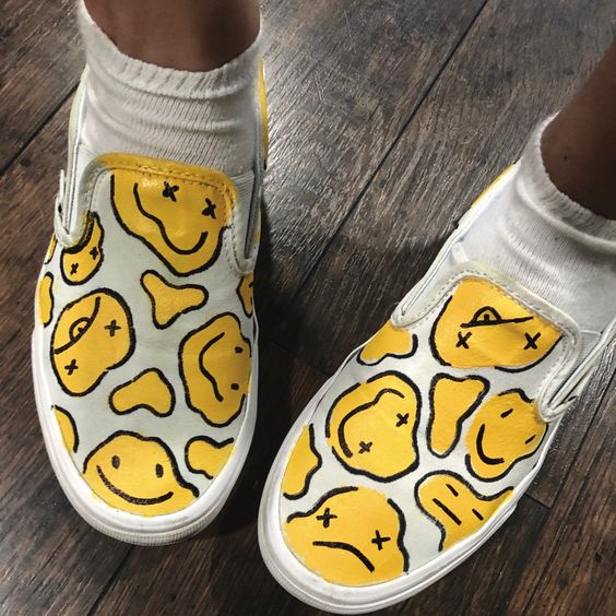 white vans with yellow smiley faces