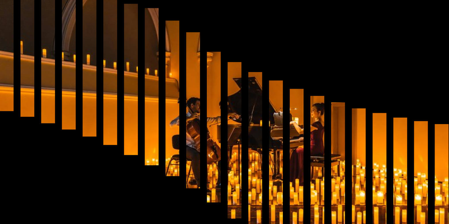 cello and piano player playing their intruments surrounded by candles 